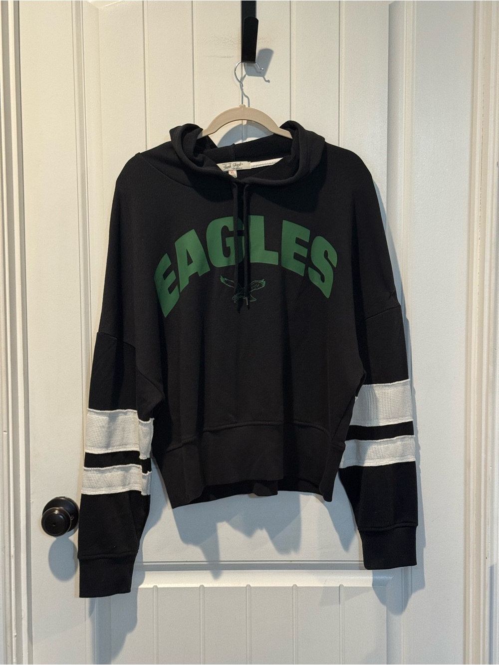Junk Food Clothing Black Crewneck Sweatshirt with Green Eagles Logo